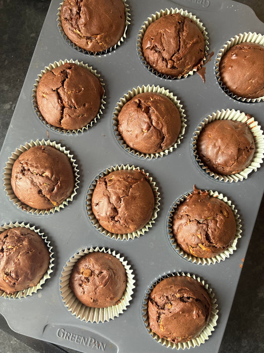 delicious looking vegetable chocolate muffins in a muffin tin